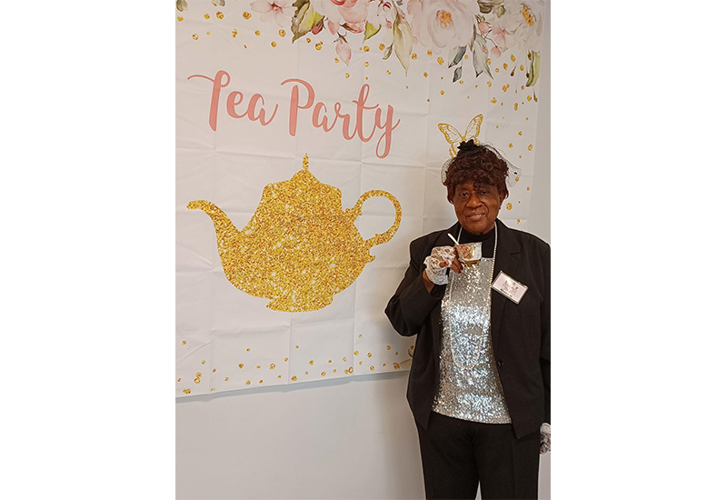 A photo of client QA at the Ladies Tea Party