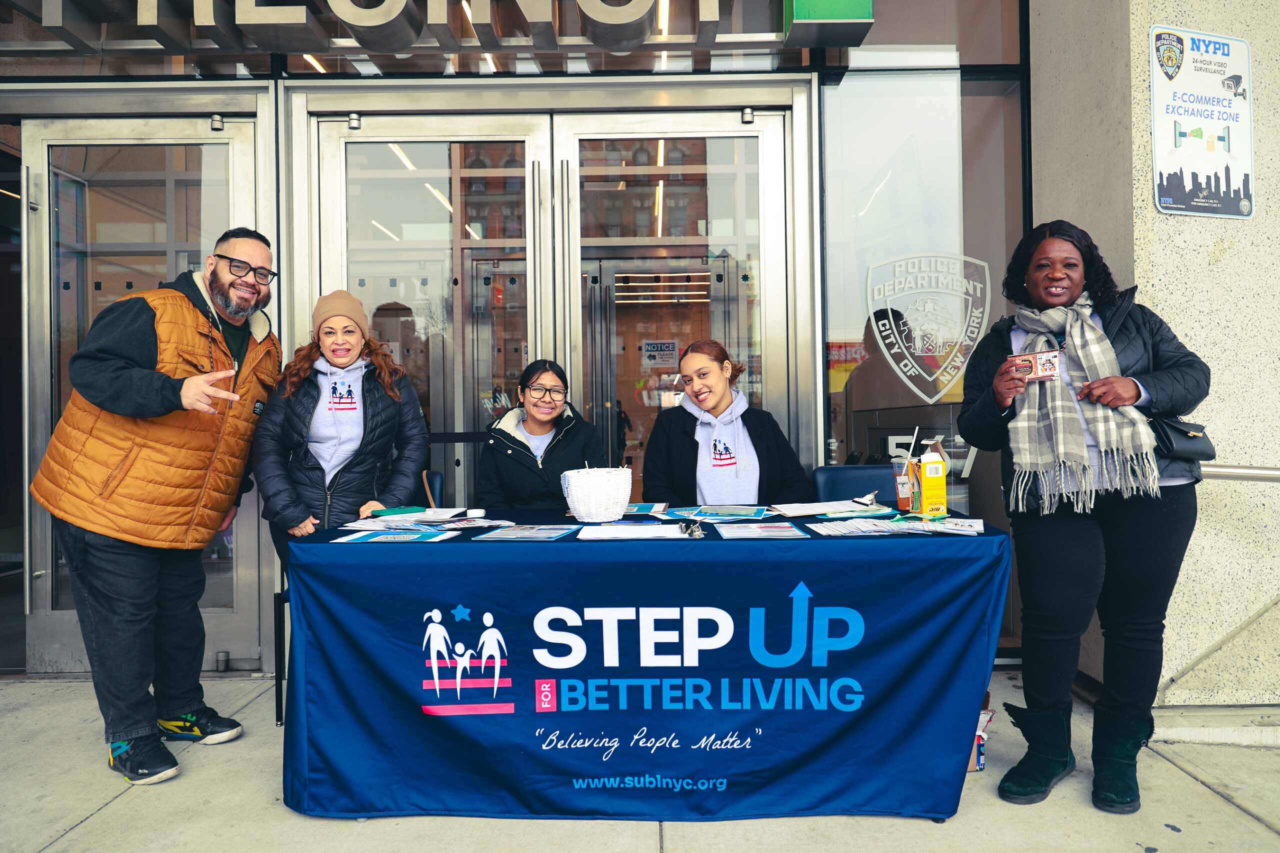 Photo of Step Up for Better Living staff and volunteers supporting people in need in the South BRonx